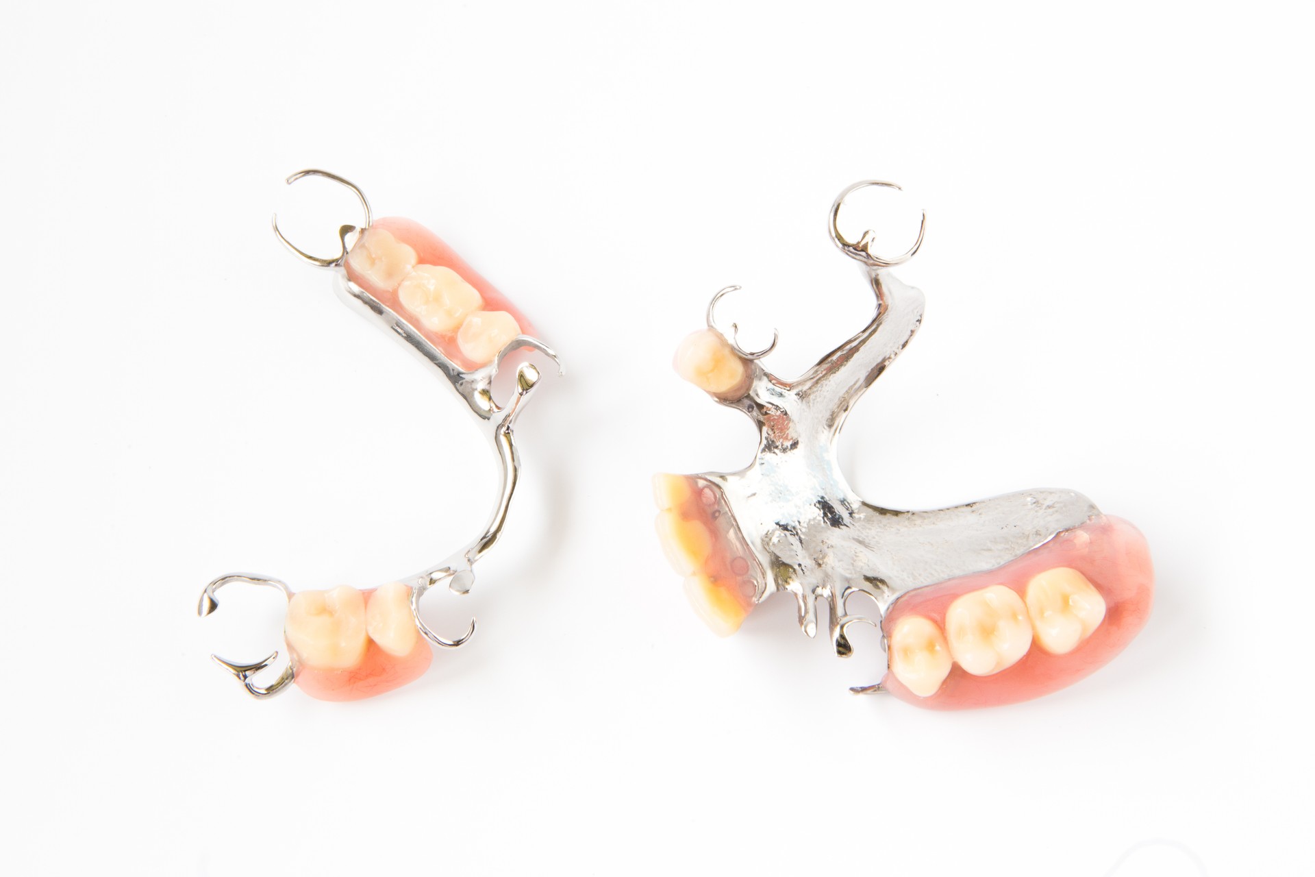 removable partial denture on white background.